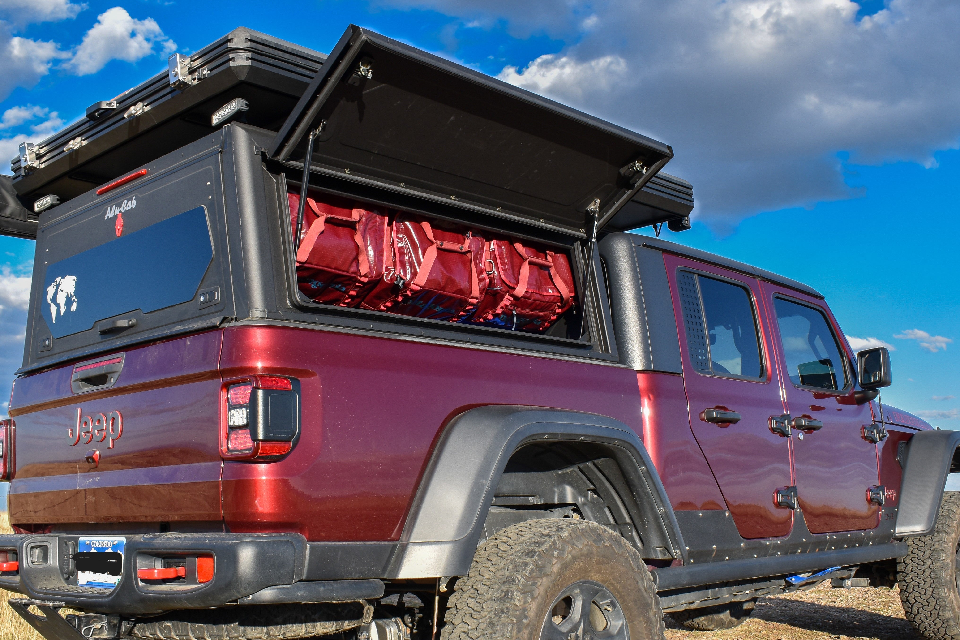 LoftLocker storage system for hanging duffels as cabinets in jeep gladiator with Alu-Cab