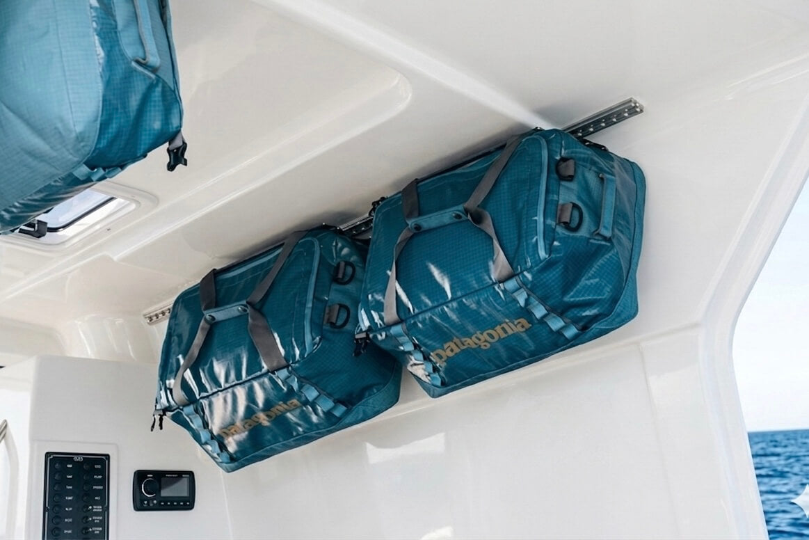Hang duffels as cabinets or shelves for boats