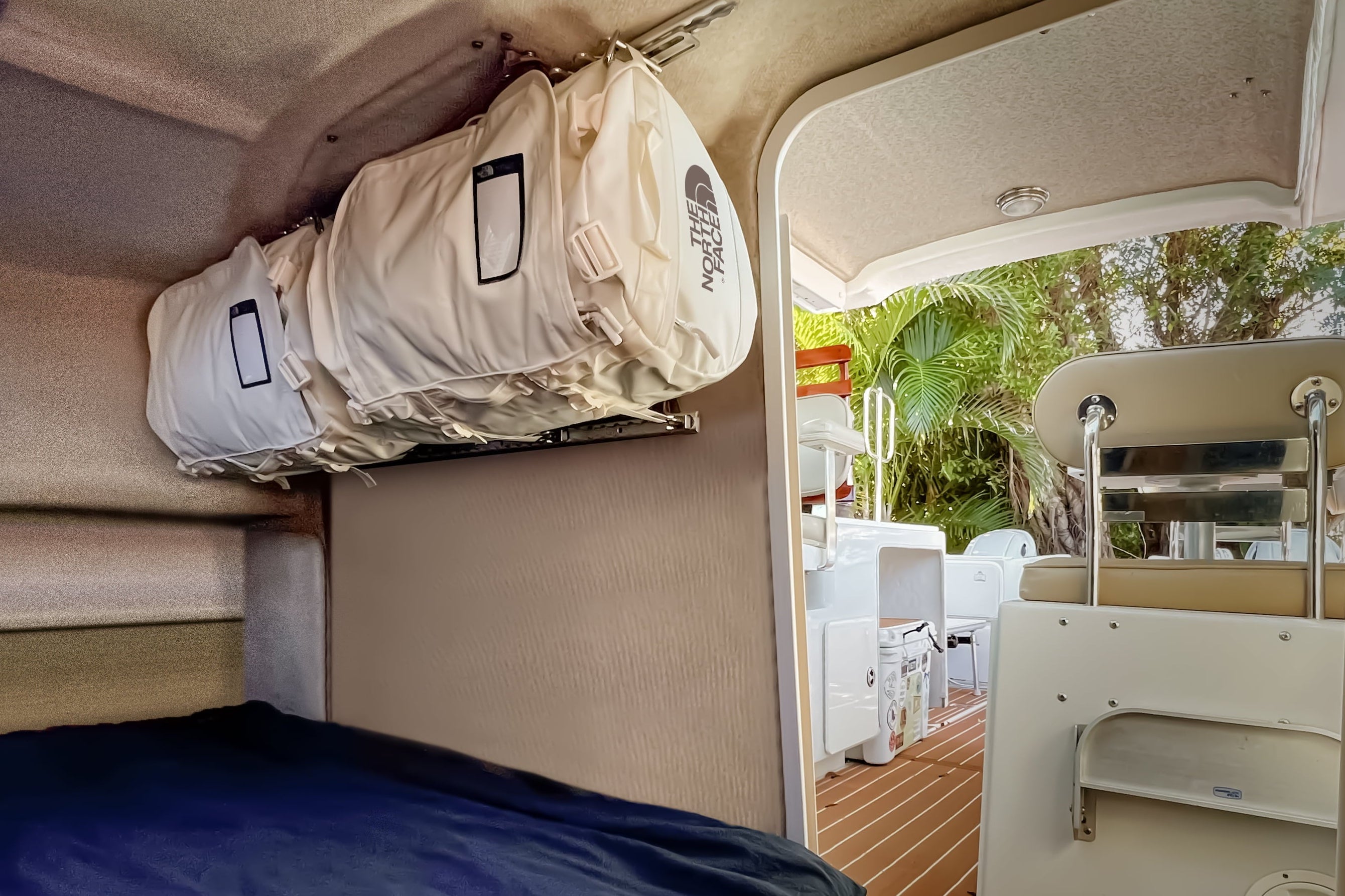 Hang duffels as cabinets or shelves for boats