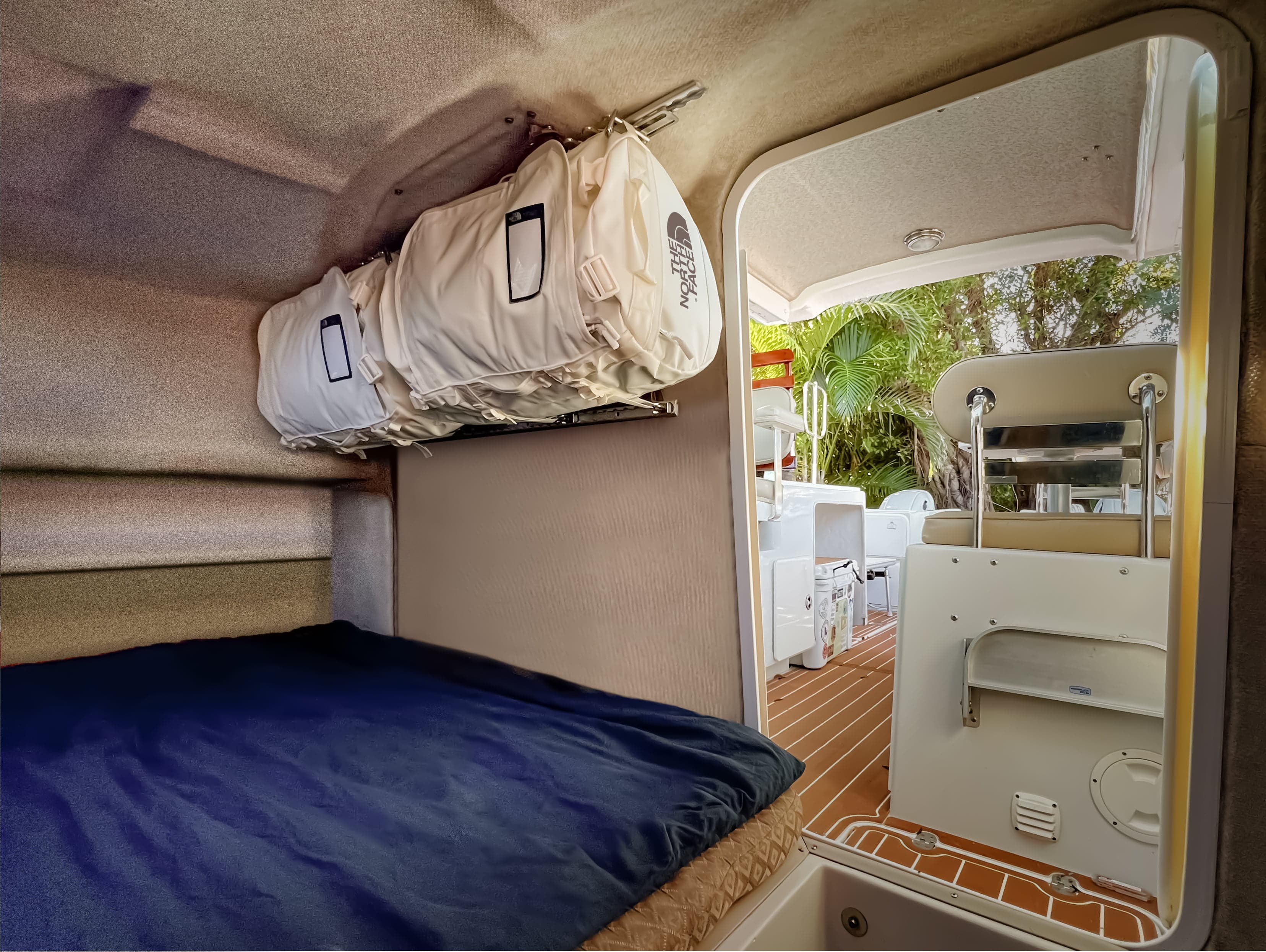 Hang duffels as cabinets or shelves for boats