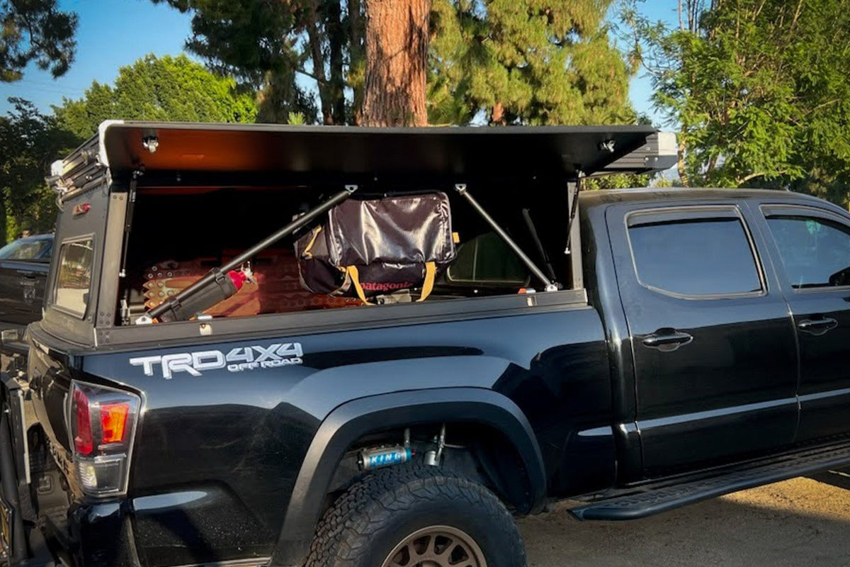 Hang duffels as cabinets in truck toppers – ideal for truck bed camping ...